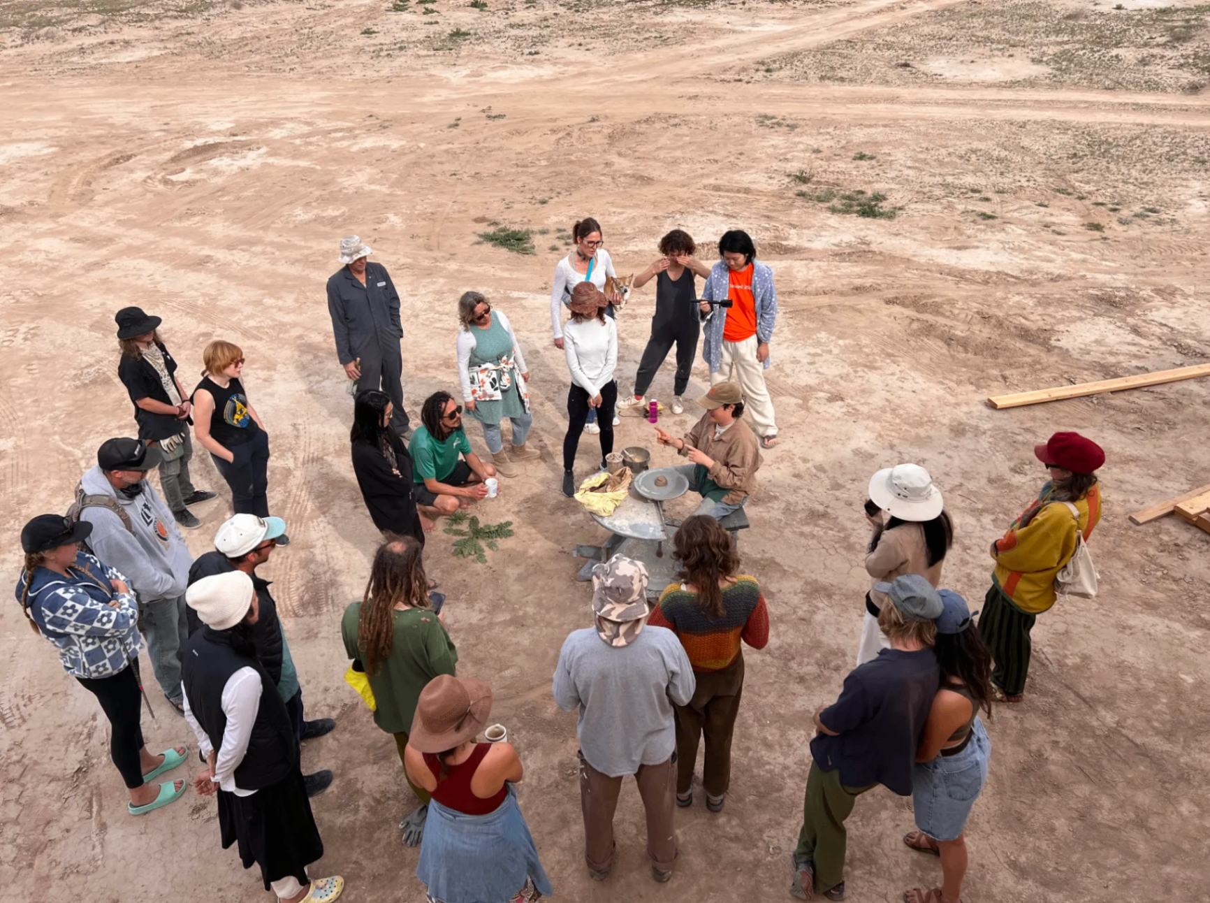 Group gathered in a circle for a camp meeting