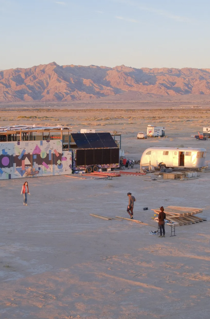 Camp and mountains in evening light